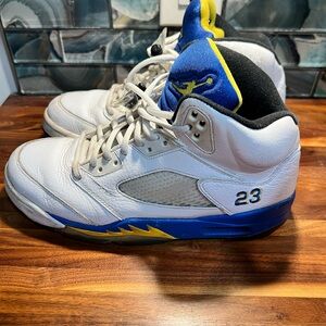 Jordan White and Blue Sneakers with Yellow Accents